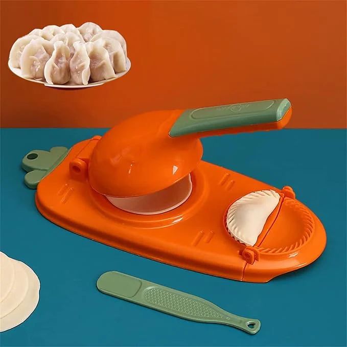 Dumpling maker with a plate of made dumplings on an orange background